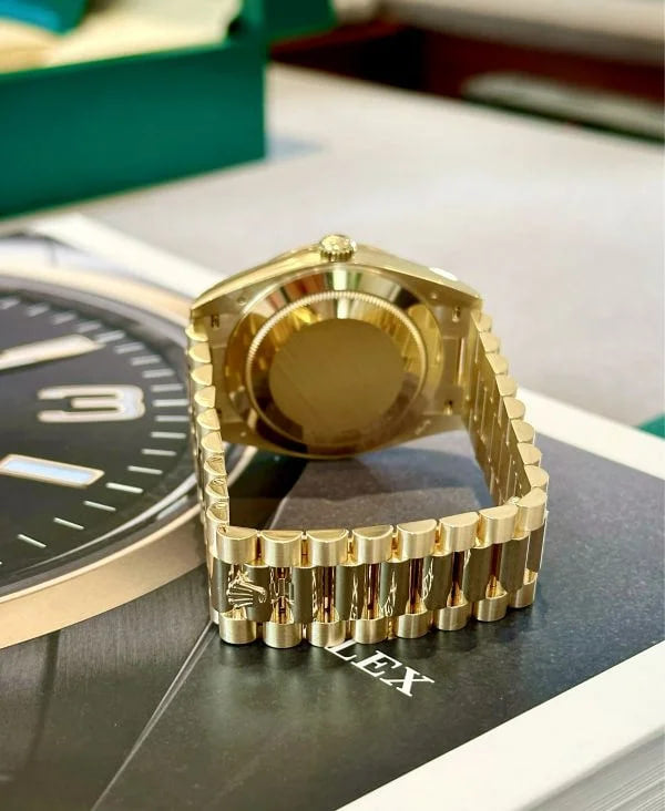 Rolex Day-Date 40 Presidential 228348 Diamond Bezel Baguette Diamond Black Dial